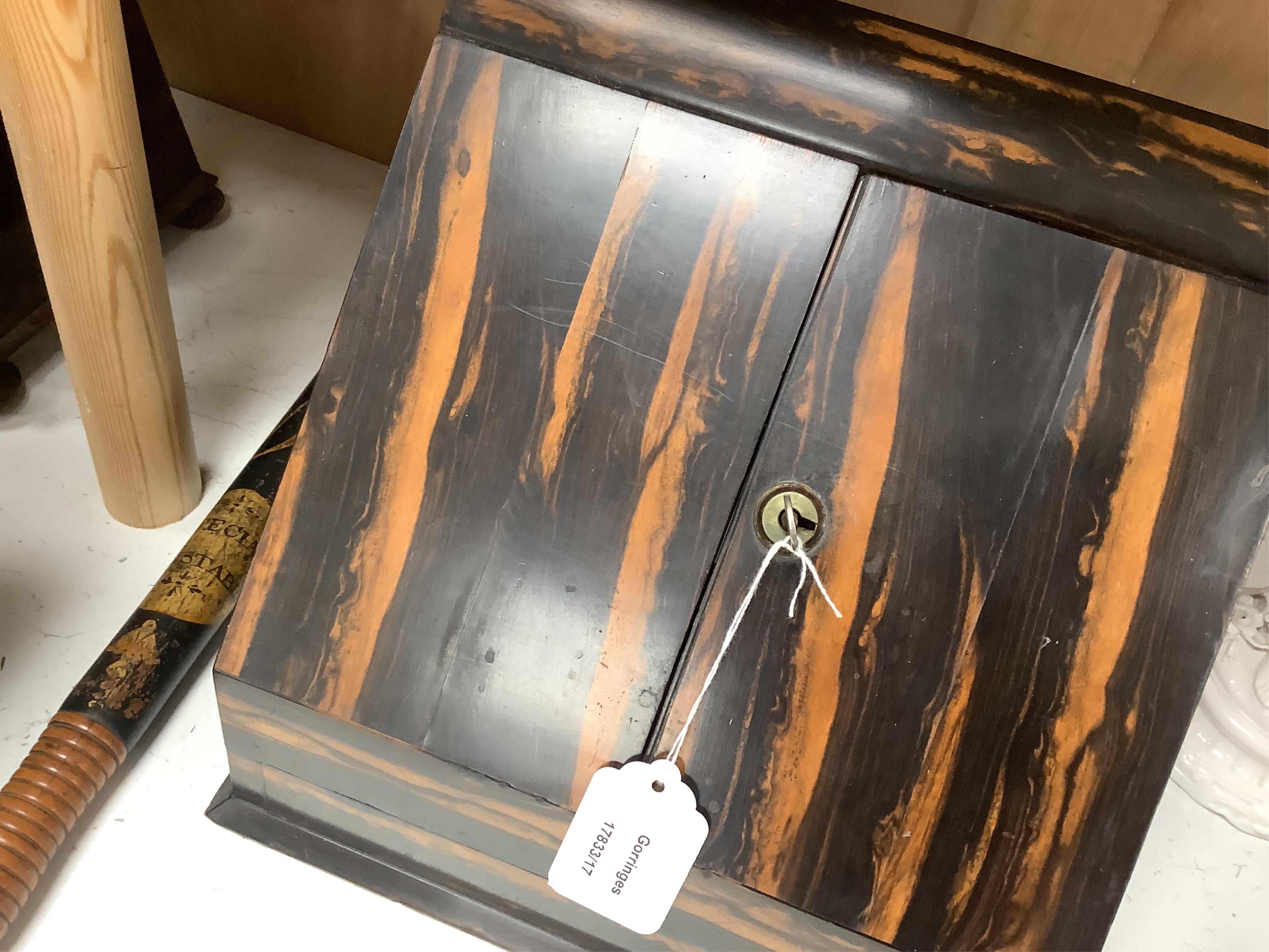 A coromandel desk top stationery box with letter rack and calendar, 29cm wide
